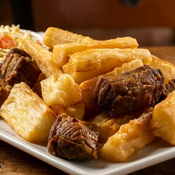 Golden fried yuca and savory beef pieces served with coleslaw.